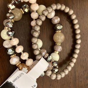 NWT set of 3 bracelets. Versatile in shades of browns, rose, off-white, copper.